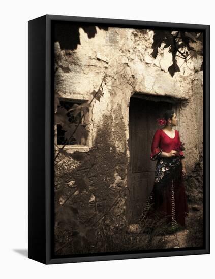 A Young Spanish Woman Wearing Traditional Flamenco Dress Standing in a Doorway to an Old Building-Steven Boone-Framed Premier Image Canvas