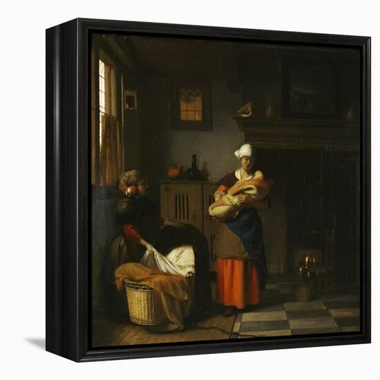 A Young Woman and a Girl Putting a Baby to Bed in a Cradle in an Interior-Pieter de Hooch-Framed Premier Image Canvas