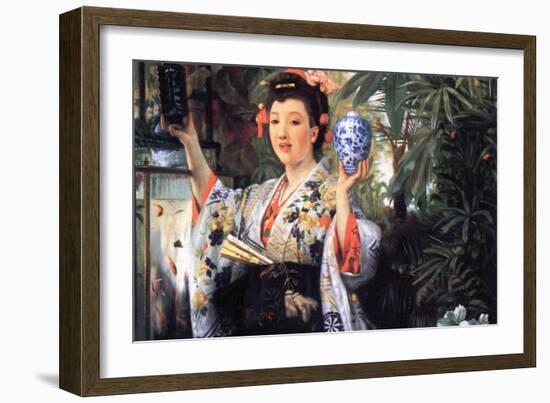 A Young Woman Holds Japanese Goods-James Tissot-Framed Art Print
