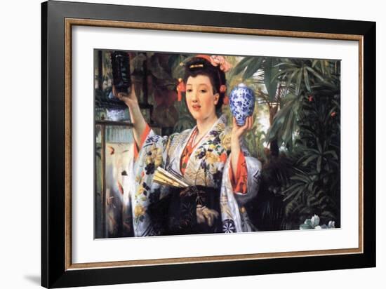 A Young Woman Holds Japanese Goods-James Tissot-Framed Art Print