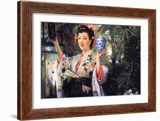 A Young Woman Holds Japanese Goods-James Tissot-Framed Art Print