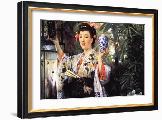 A Young Woman Holds Japanese Goods-James Tissot-Framed Art Print