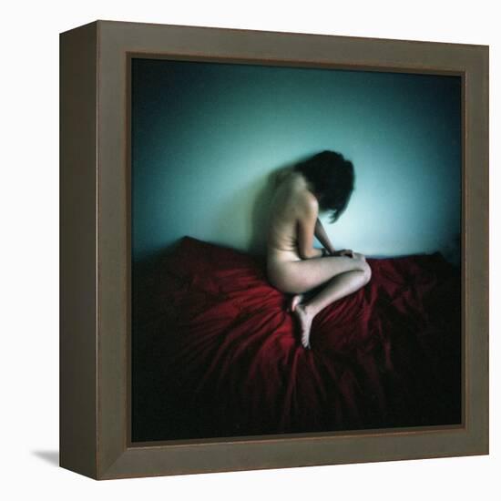 A Young Woman Sat on a Red Bed Sheet-Rafal Bednarz-Framed Premier Image Canvas