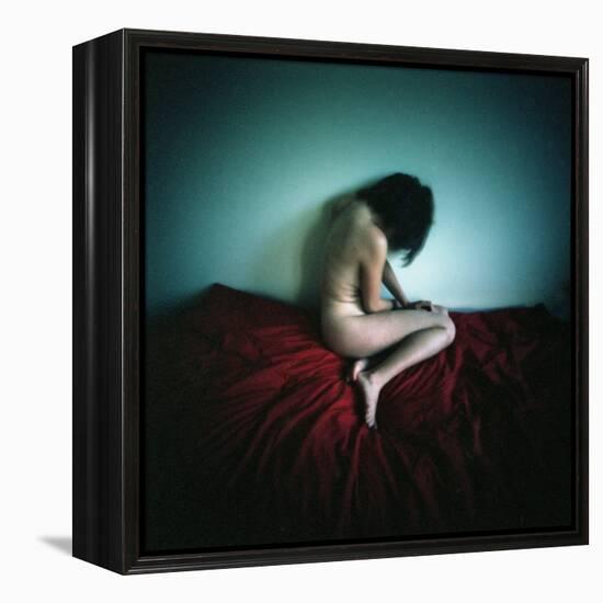 A Young Woman Sat on a Red Bed Sheet-Rafal Bednarz-Framed Premier Image Canvas