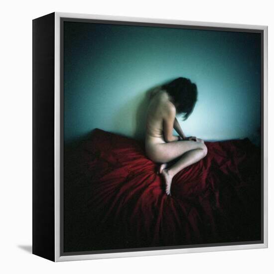 A Young Woman Sat on a Red Bed Sheet-Rafal Bednarz-Framed Premier Image Canvas