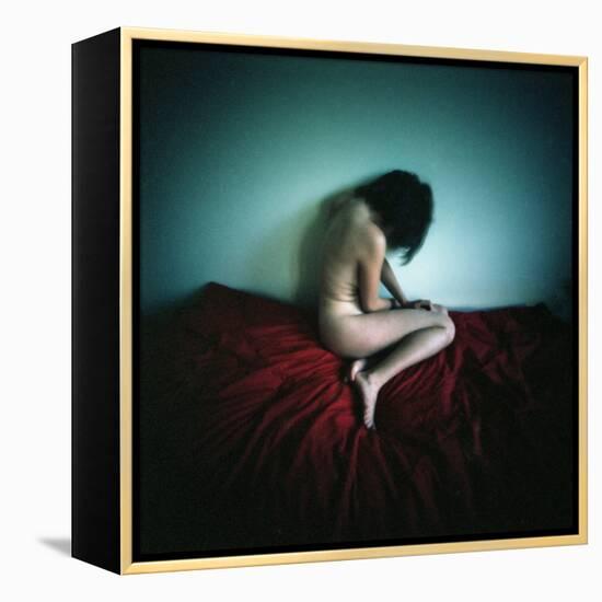 A Young Woman Sat on a Red Bed Sheet-Rafal Bednarz-Framed Premier Image Canvas