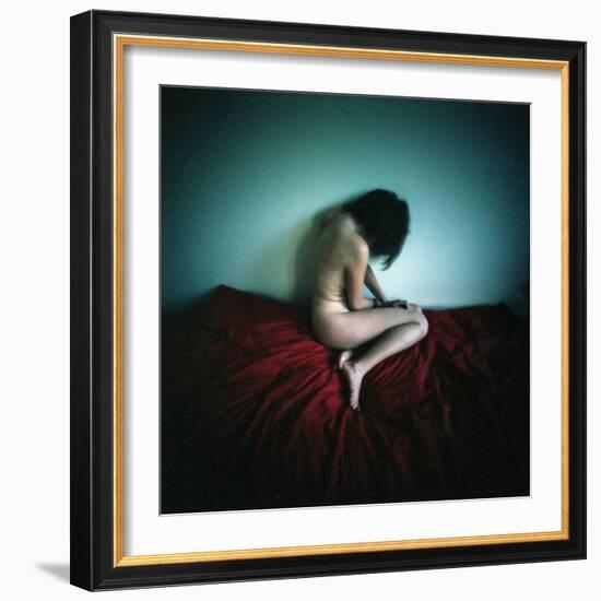 A Young Woman Sat on a Red Bed Sheet-Rafal Bednarz-Framed Photographic Print