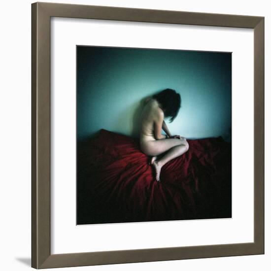 A Young Woman Sat on a Red Bed Sheet-Rafal Bednarz-Framed Photographic Print