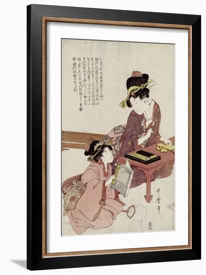 A Young Woman Seated at a Desk Writing, a Girl with a Book Looks On-Kitagawa Utamaro-Framed Giclee Print