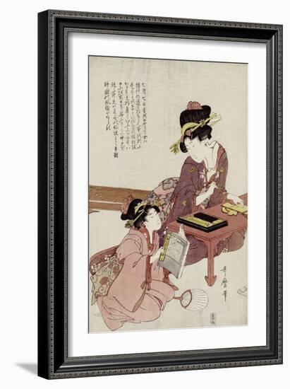 A Young Woman Seated at a Desk Writing, a Girl with a Book Looks On-Kitagawa Utamaro-Framed Giclee Print