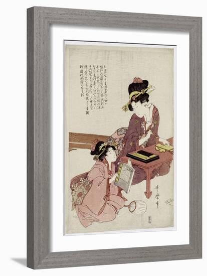 A Young Woman Seated at a Desk, Writing, a Girl with a Book Looks On-Kitagawa Utamaro-Framed Giclee Print