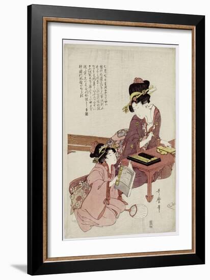 A Young Woman Seated at a Desk, Writing, a Girl with a Book Looks On-Kitagawa Utamaro-Framed Giclee Print