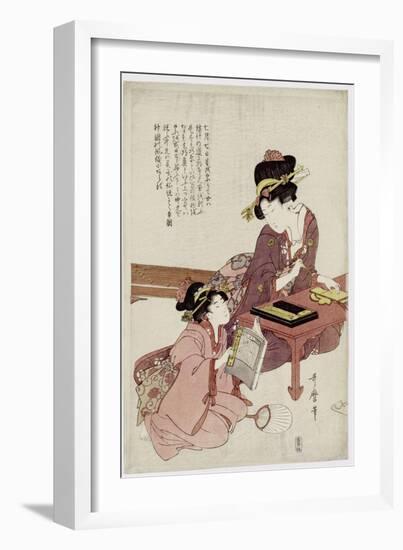 A Young Woman Seated at a Desk, Writing, a Girl with a Book Looks On-Kitagawa Utamaro-Framed Giclee Print