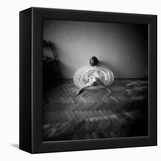 A Young Woman Sitting on a Pargued Floor-Rafal Bednarz-Framed Premier Image Canvas