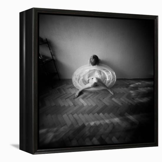 A Young Woman Sitting on a Pargued Floor-Rafal Bednarz-Framed Premier Image Canvas