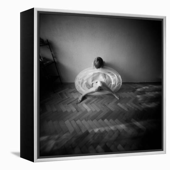 A Young Woman Sitting on a Pargued Floor-Rafal Bednarz-Framed Premier Image Canvas