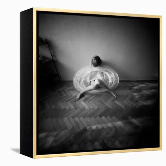 A Young Woman Sitting on a Pargued Floor-Rafal Bednarz-Framed Premier Image Canvas