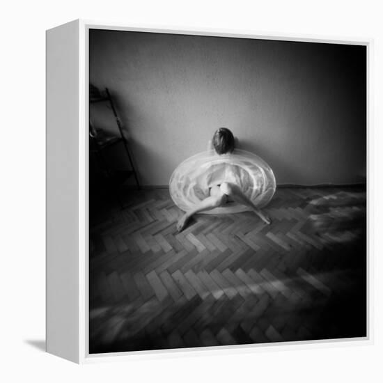 A Young Woman Sitting on a Pargued Floor-Rafal Bednarz-Framed Premier Image Canvas