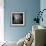 A Young Woman Sitting on a Pargued Floor-Rafal Bednarz-Framed Photographic Print displayed on a wall