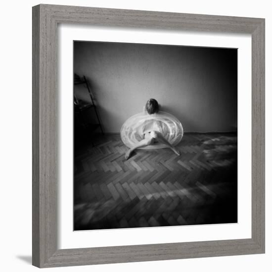 A Young Woman Sitting on a Pargued Floor-Rafal Bednarz-Framed Photographic Print