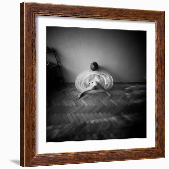 A Young Woman Sitting on a Pargued Floor-Rafal Bednarz-Framed Photographic Print