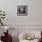 A Young Woman Sitting on a Pargued Floor-Rafal Bednarz-Framed Photographic Print displayed on a wall