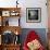 A Young Woman Sitting on a Pargued Floor-Rafal Bednarz-Framed Photographic Print displayed on a wall