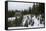 A Young Woman Skins Up A Hill Towards A Hut In The Backcountry Near Mt Rainier National Park, Wa-Michael Hanson-Framed Stretched Canvas