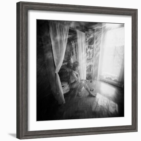 A Young Woman Smoking a Cigarette Seated in the Sunlight Shining through a Window-Rafal Bednarz-Framed Photographic Print