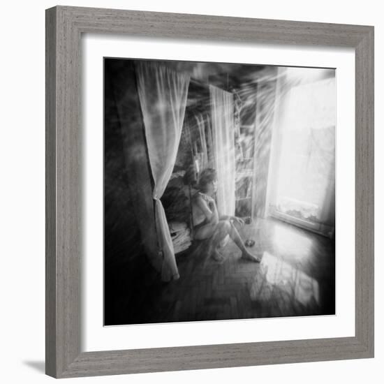 A Young Woman Smoking a Cigarette Seated in the Sunlight Shining through a Window-Rafal Bednarz-Framed Photographic Print