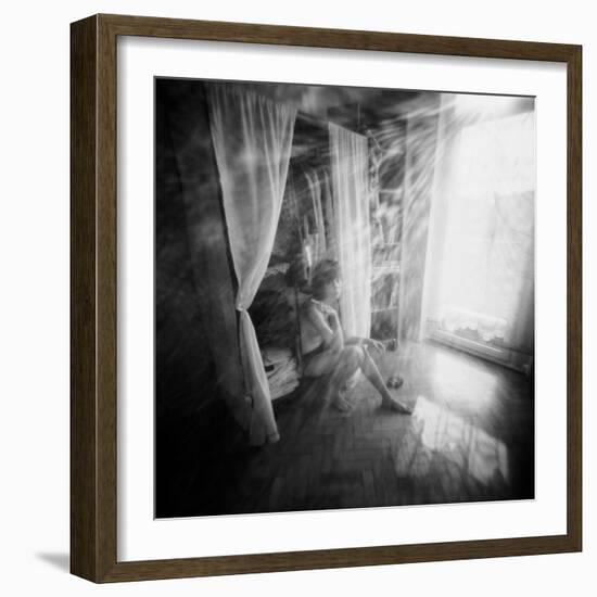 A Young Woman Smoking a Cigarette Seated in the Sunlight Shining through a Window-Rafal Bednarz-Framed Photographic Print