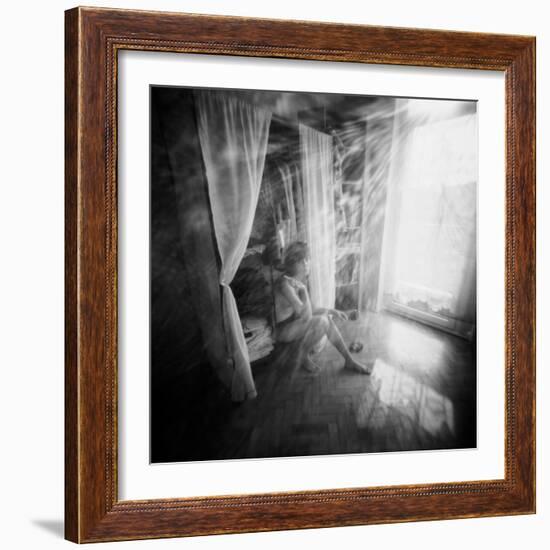 A Young Woman Smoking a Cigarette Seated in the Sunlight Shining through a Window-Rafal Bednarz-Framed Photographic Print