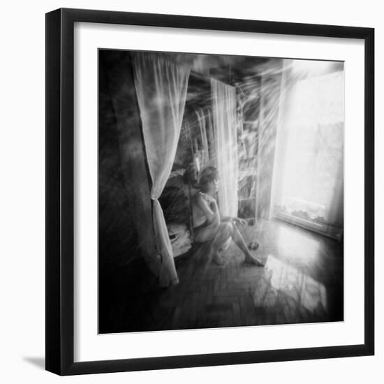 A Young Woman Smoking a Cigarette Seated in the Sunlight Shining through a Window-Rafal Bednarz-Framed Photographic Print
