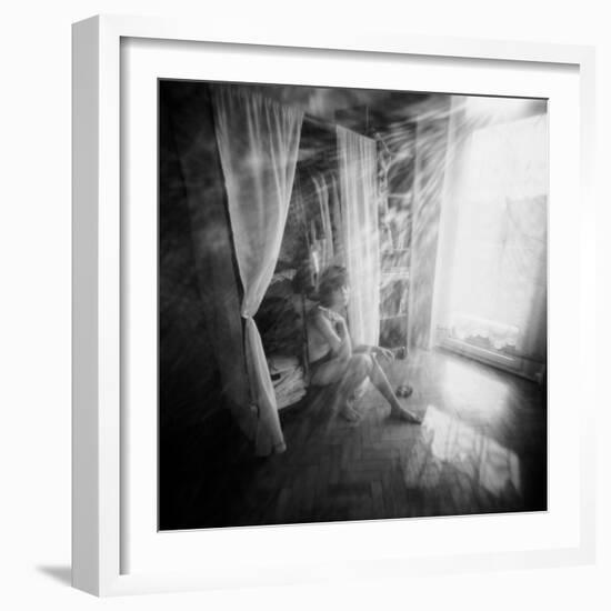 A Young Woman Smoking a Cigarette Seated in the Sunlight Shining through a Window-Rafal Bednarz-Framed Photographic Print