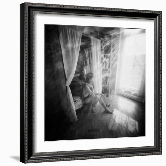 A Young Woman Smoking a Cigarette Seated in the Sunlight Shining through a Window-Rafal Bednarz-Framed Photographic Print