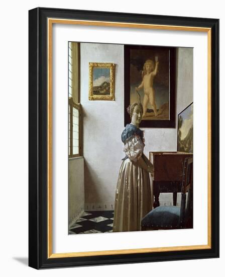 A Young Woman Standing at a Virginal. C.1670-Johannes Vermeer-Framed Giclee Print