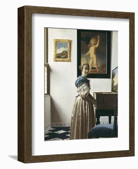 A Young Woman Standing at a Virginal-Johannes Vermeer-Framed Art Print