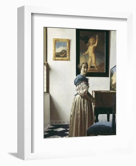 A Young Woman Standing at a Virginal-Johannes Vermeer-Framed Art Print