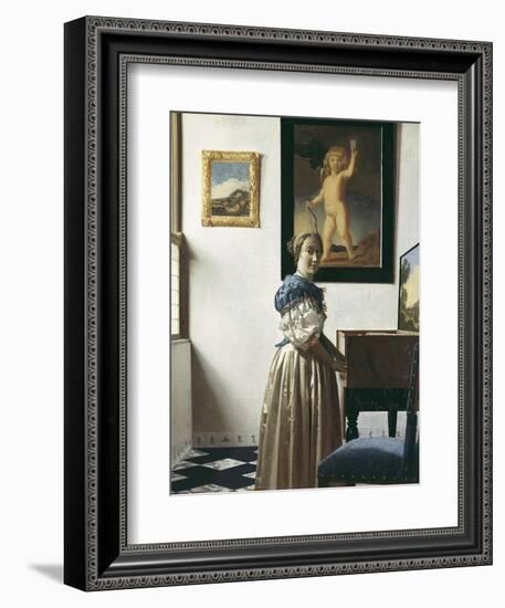 A Young Woman Standing at a Virginal-Johannes Vermeer-Framed Art Print