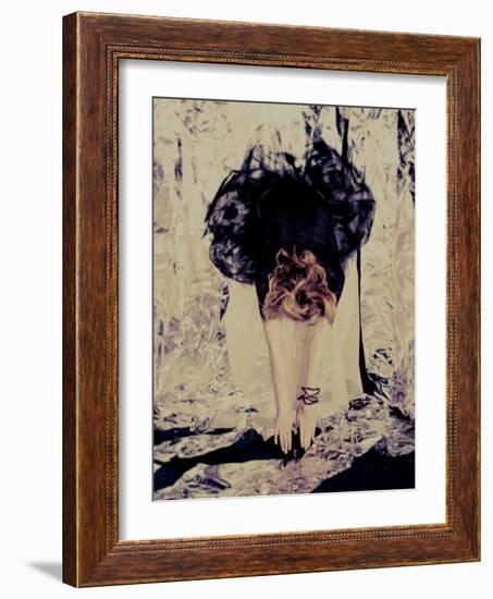 A Young Woman with Red Hair Leaning Forward and Touching Her Toes-India Hobson-Framed Photographic Print