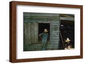 A Young Women Plucks Feathers from a Chicken, Edisto Island, South Carolina, 1956-Walter Sanders-Framed Photographic Print