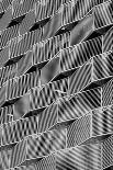 Modern Steel Cladding with Angular Geometric Patterns and Square Holes in a Shiny Metal-a40757-Photographic Print