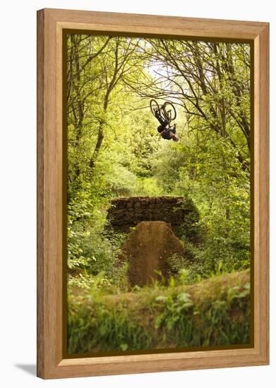 Aalen, Baden-Württemberg, Germany: A Young Freestyle Mt Biker Riding At A Secret Dirt Jump Spot-Axel Brunst-Framed Premier Image Canvas