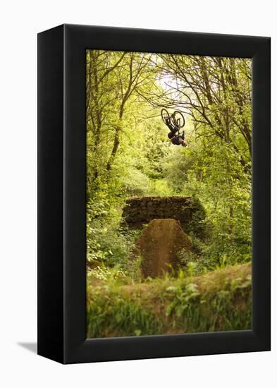 Aalen, Baden-Württemberg, Germany: A Young Freestyle Mt Biker Riding At A Secret Dirt Jump Spot-Axel Brunst-Framed Premier Image Canvas