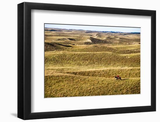 Aaron Price Riding His Horse 'Beau' over His Ranch, Gracie Creek, Sandhills, Nebraska-Cheryl-Samantha Owen-Framed Photographic Print