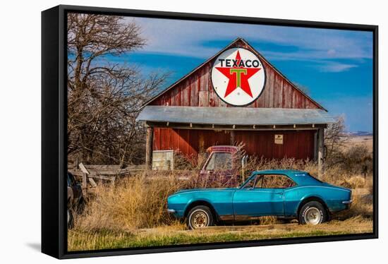 Abandoned blue Camaro Chevrolete in front of deserted Texaco Station, remote part of Nebraska-null-Framed Stretched Canvas