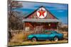 Abandoned blue Camaro Chevrolete in front of deserted Texaco Station, remote part of Nebraska-null-Mounted Photographic Print