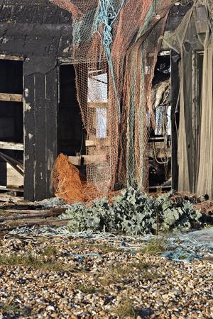 Abandoned Shed And Lighthouse In Coastal Dungeness Kent South