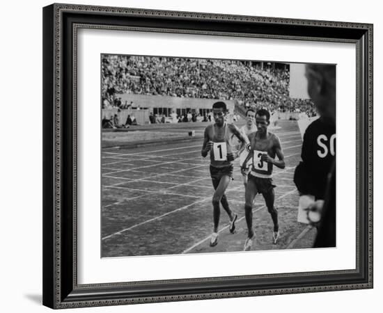 Abebe Bikila and Mamo Wolde in Exhibition Race at Berlin Olympic Stadium-null-Framed Premium Photographic Print