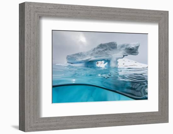 Above and below view of an arch formed in an iceberg at Cuverville Island, Ererra Channel-Michael Nolan-Framed Photographic Print